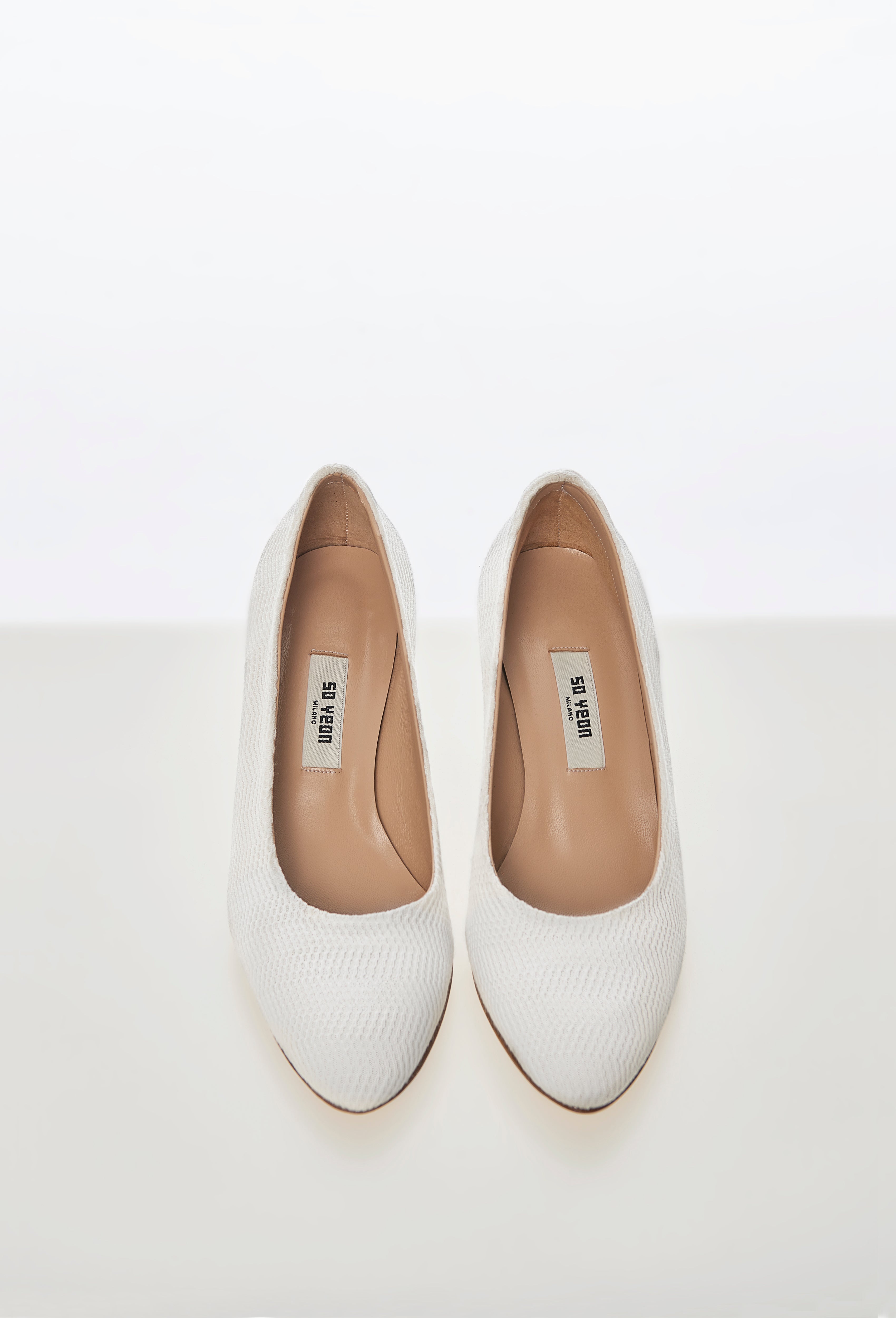 Geometric Rib-Knit Pumps in White